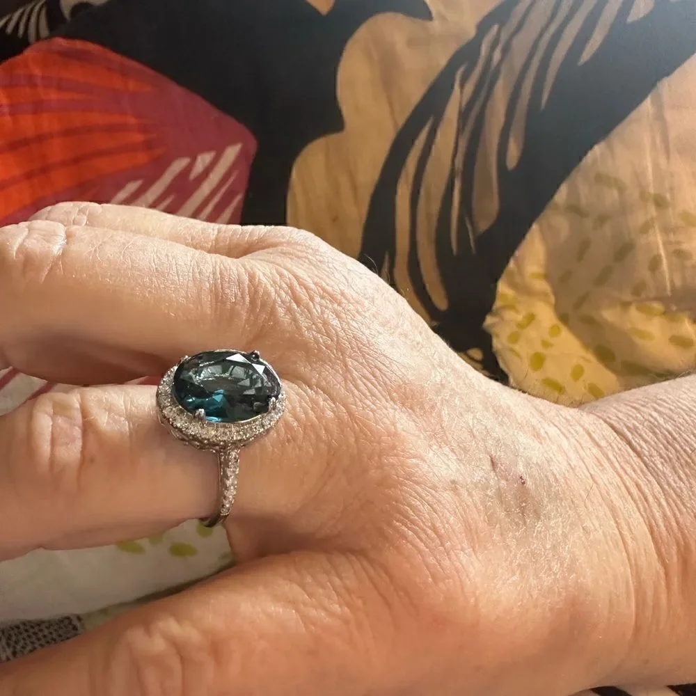 ⭐️Huge ⭐️ Dark Blue Oval Topaz With CZ White Surrounding Main Gemstone Cockta…